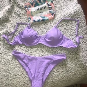 Brand new bathing suit. Can fit M/L